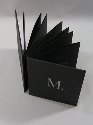 M.